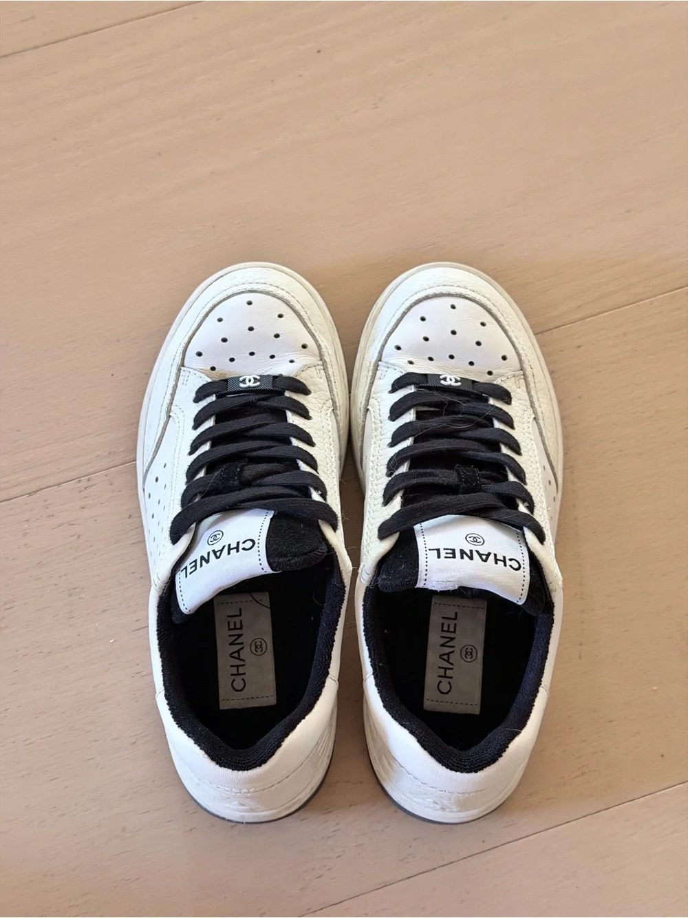 CHANEL White & Black Interlocking CC Logo Leather Sneakers